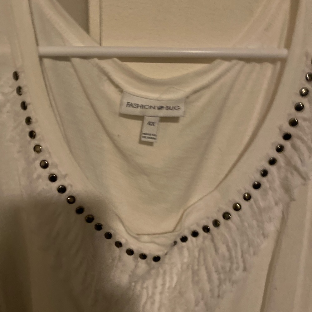 Top with fringe and studs